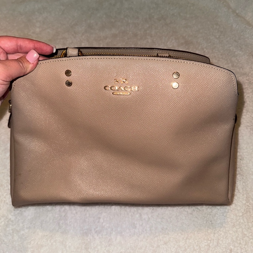Tan Coach purse